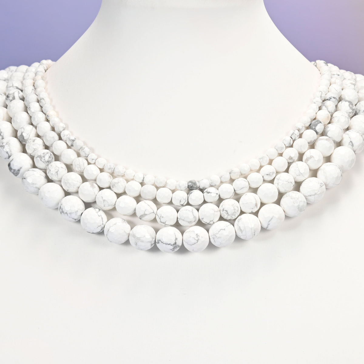 White howlite beads, faceted round, 4mm to 10mm