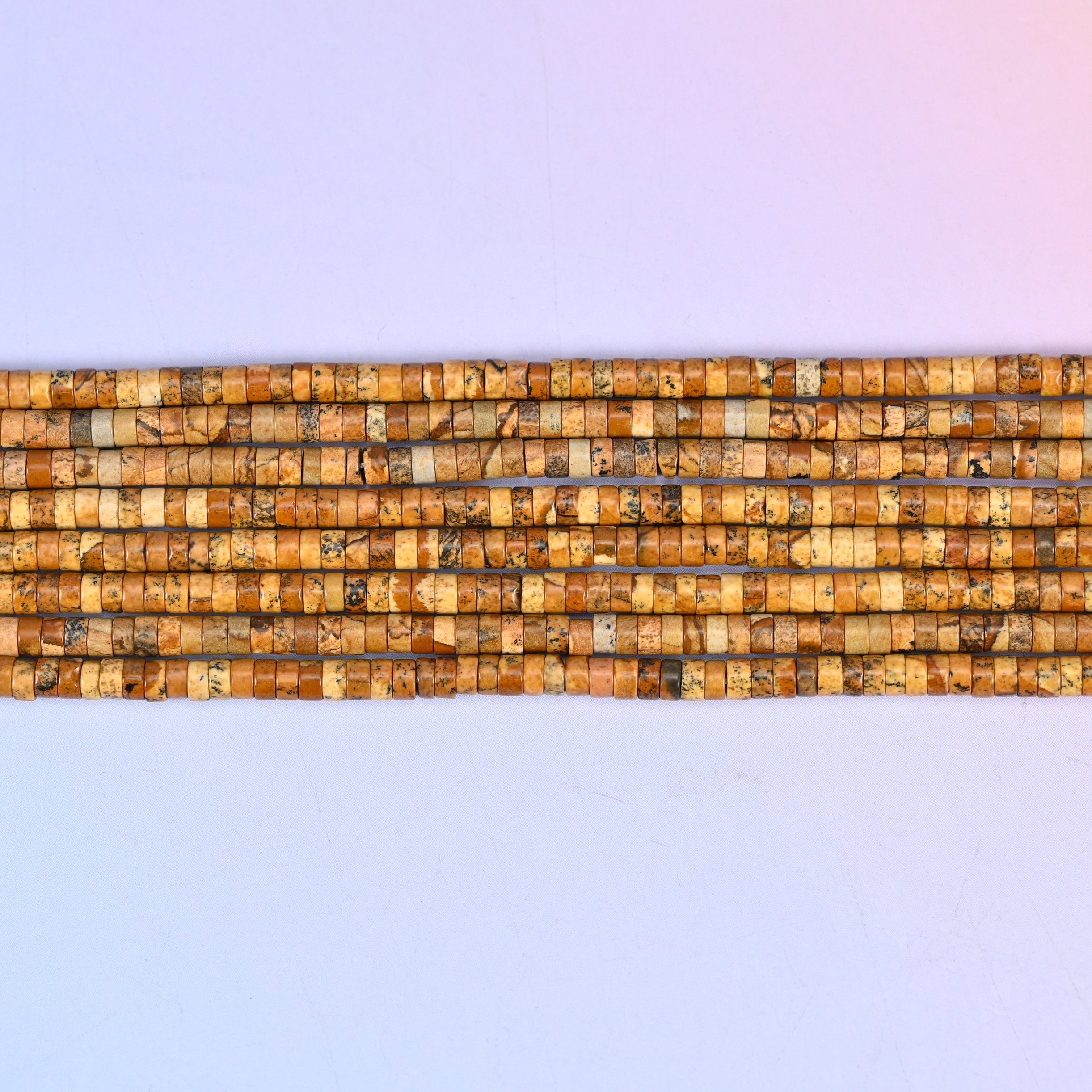 Picture Jasper Smooth Heishi Disc Beads in tan, brown and amber landscape patterning