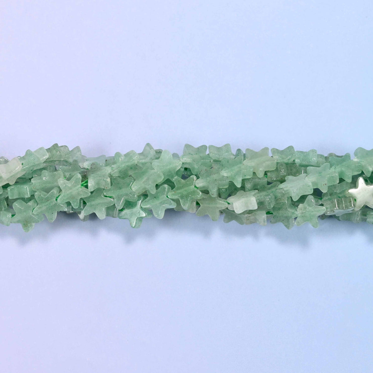 Green aventurine flat star beads, approximately 75 per strand