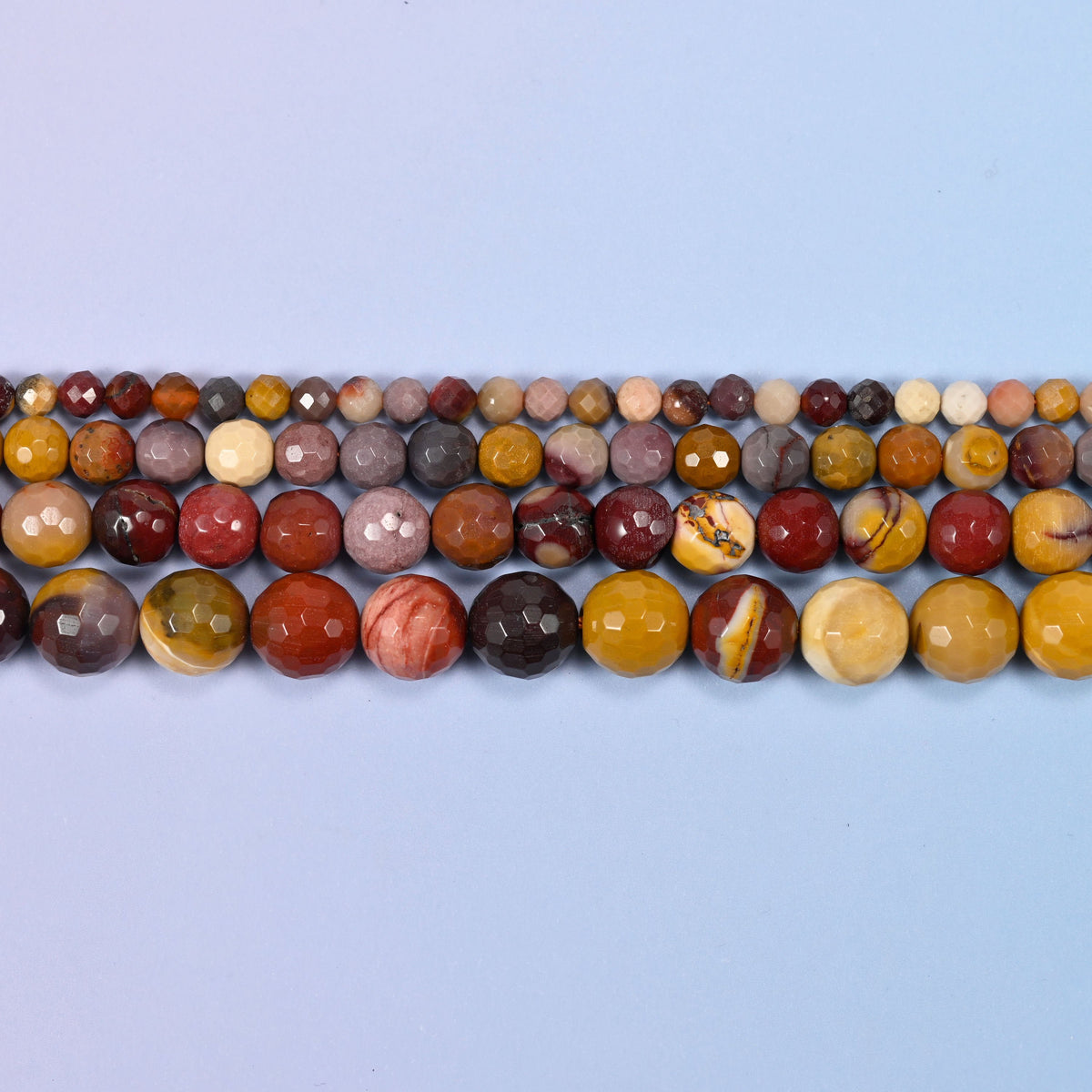 Mookaite Faceted Round Beads in mustard yellow, brick red and plum