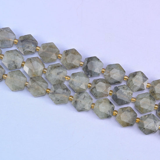 Gray labradorite beads in smoky grey-green with dark mineral speckling