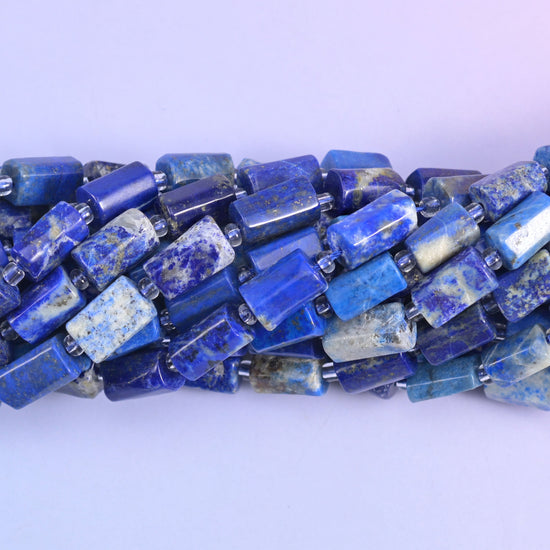 Faceted tube cut lapis beads