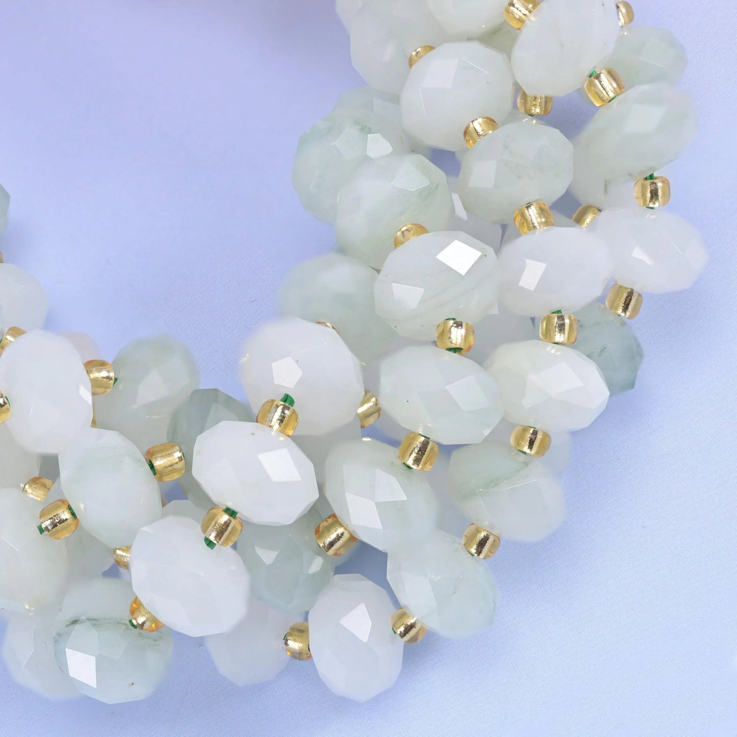 Faceted rondelle cut tianshan jade beads
