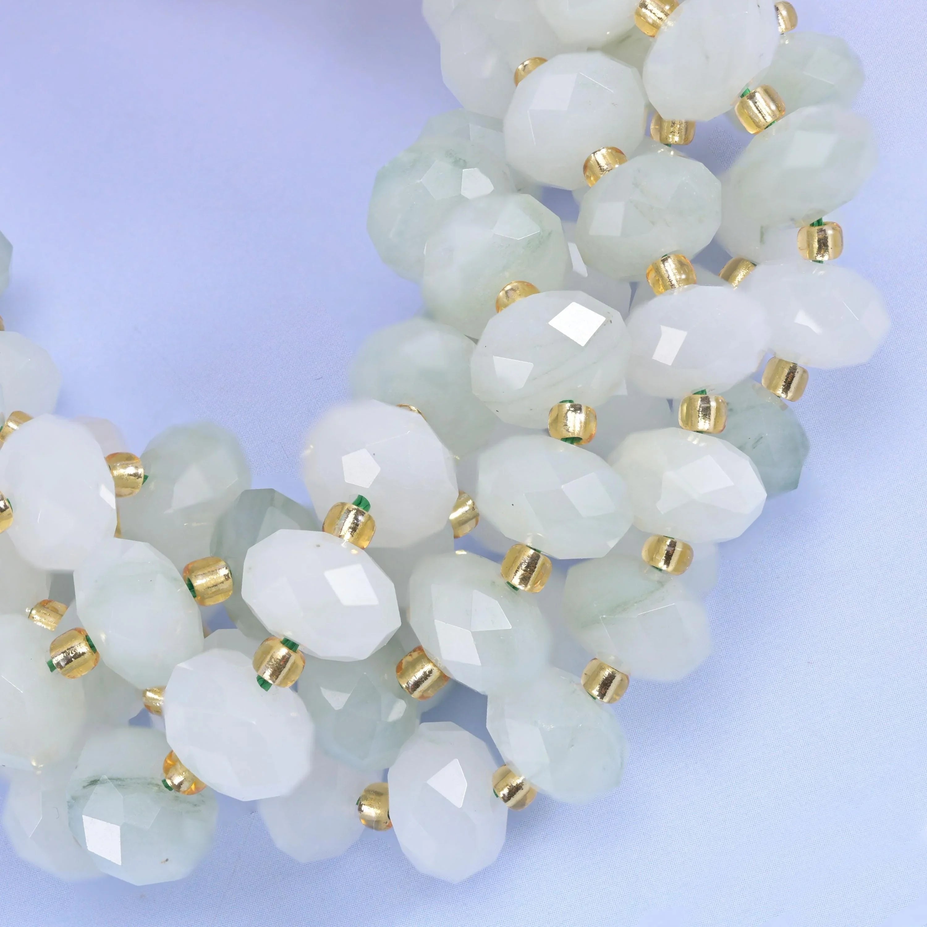 Faceted rondelle cut tianshan jade beads