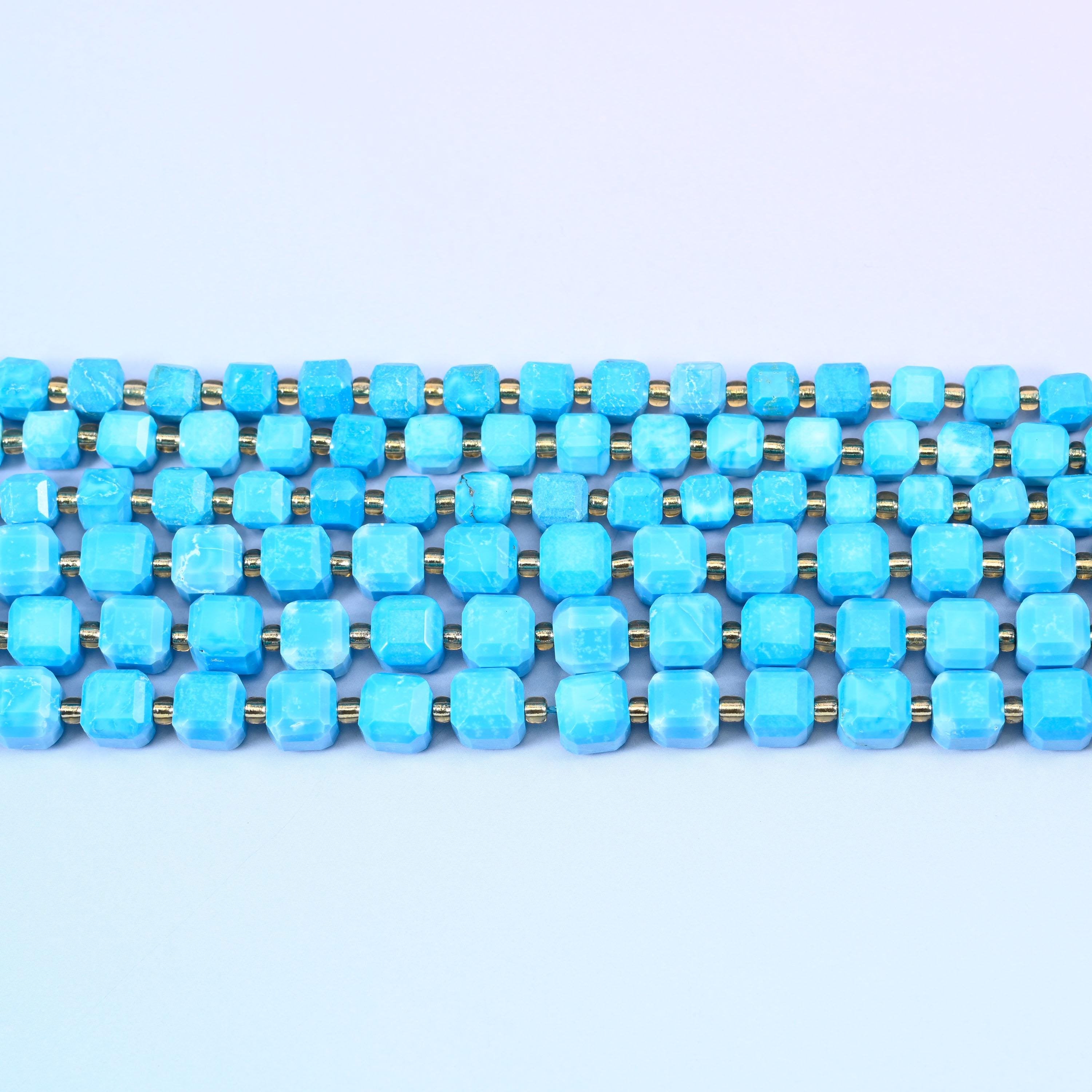 Dyed Blue Howlite beads in bright turquoise-blue with pale white veining