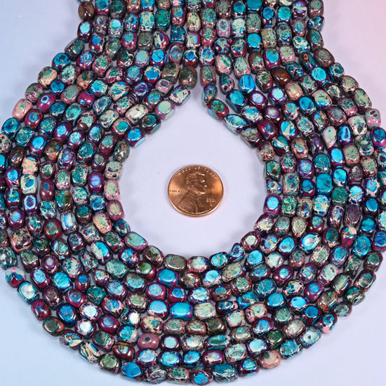 Purple Dyed Sea Sediment Jasper Beads, the applied purple stays even from bead to bead.