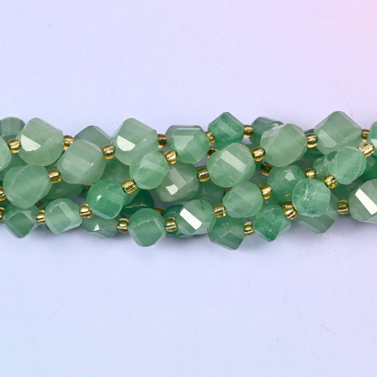 Lightly translucent green aventurine with paler cloudy zones