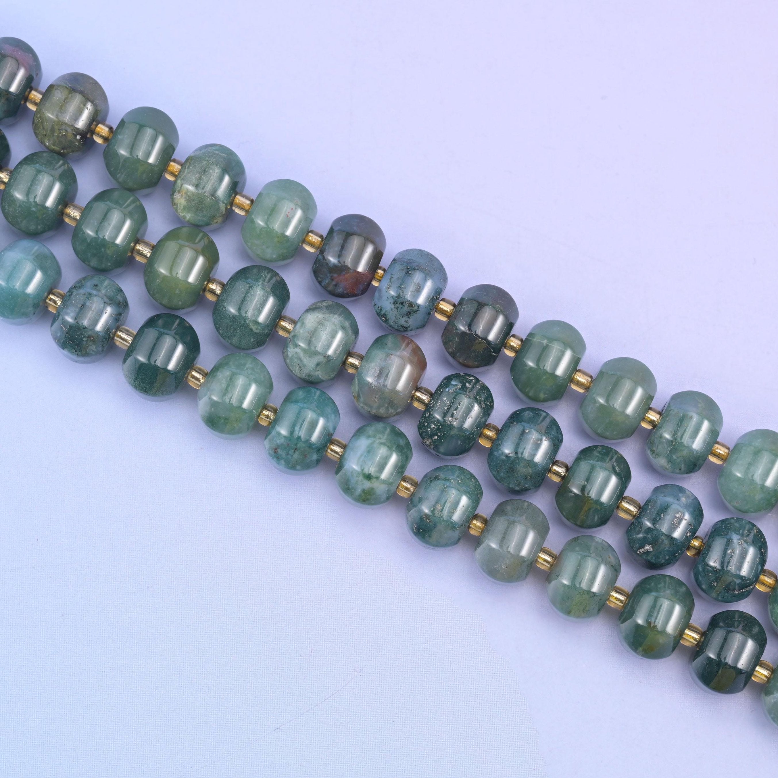 Moss agate beads in deep forest green with cloudy moss-like inclusions
