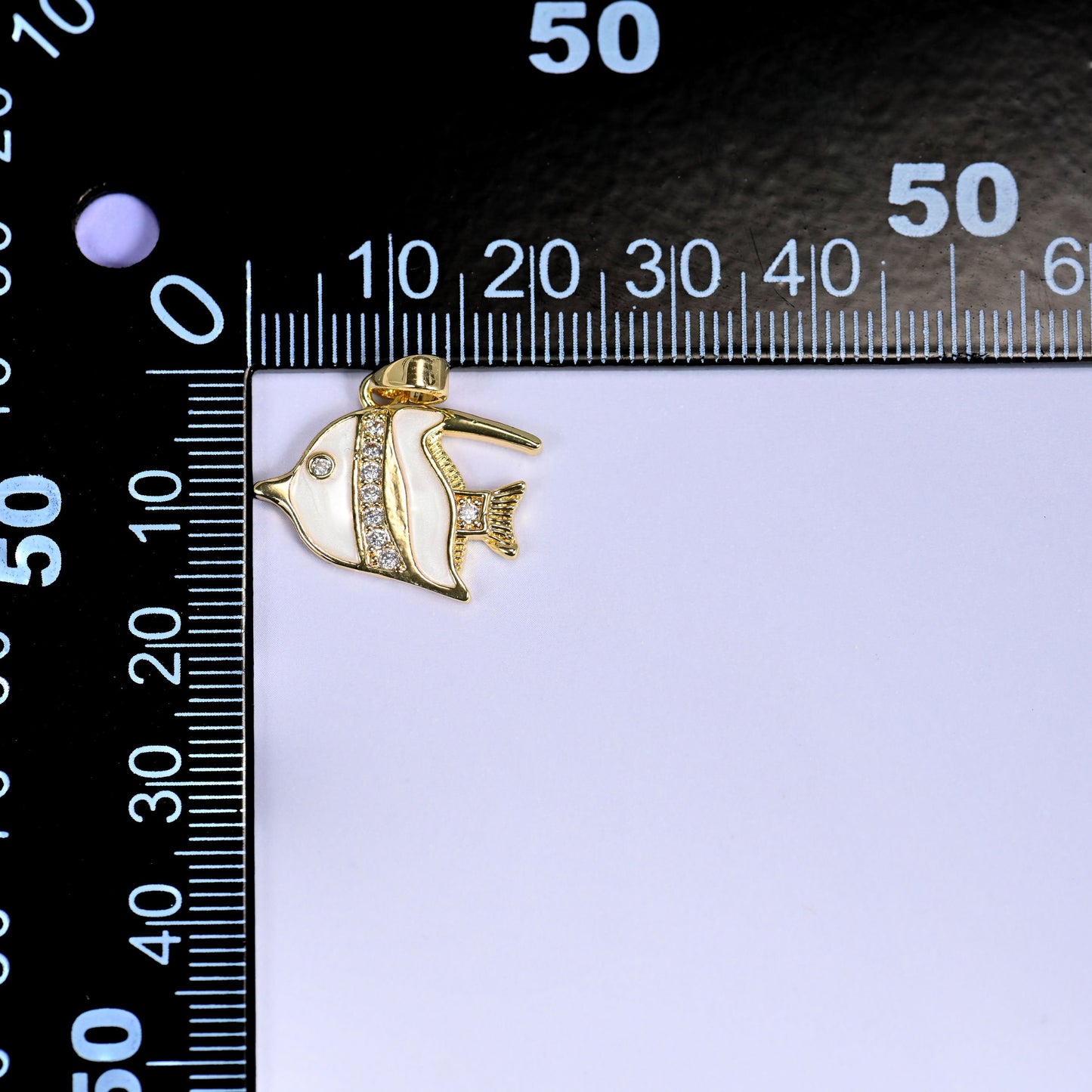 18K Gold Plated Brass Tropical Fish Charm Pendant with a white shell body, a sparkling zircon stripe, and gold fin and tail details