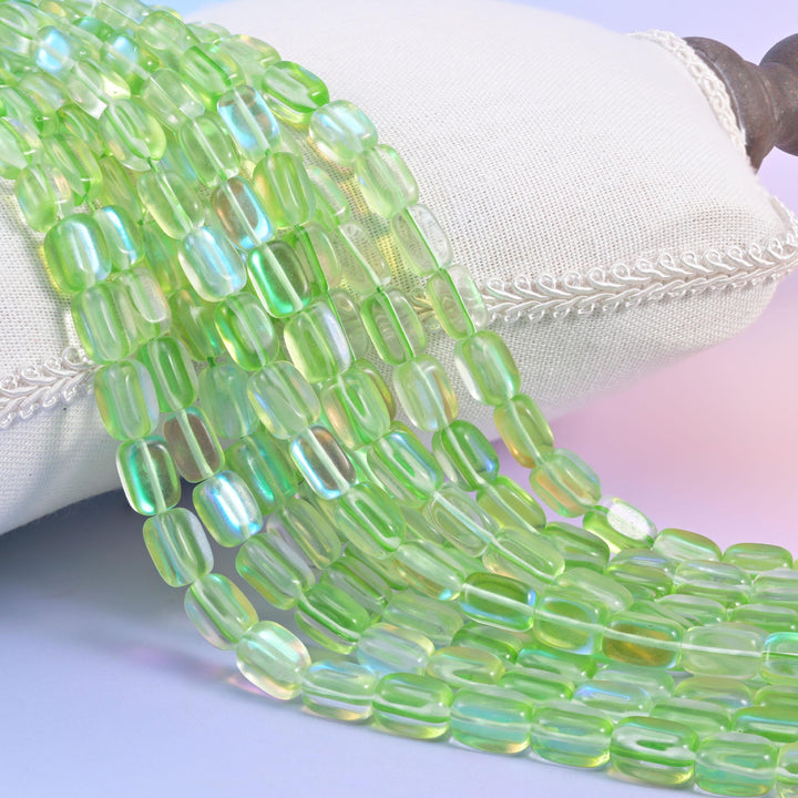 Green Mystic Aura glass beads in a rectangular cut with a glossy transparent finish
