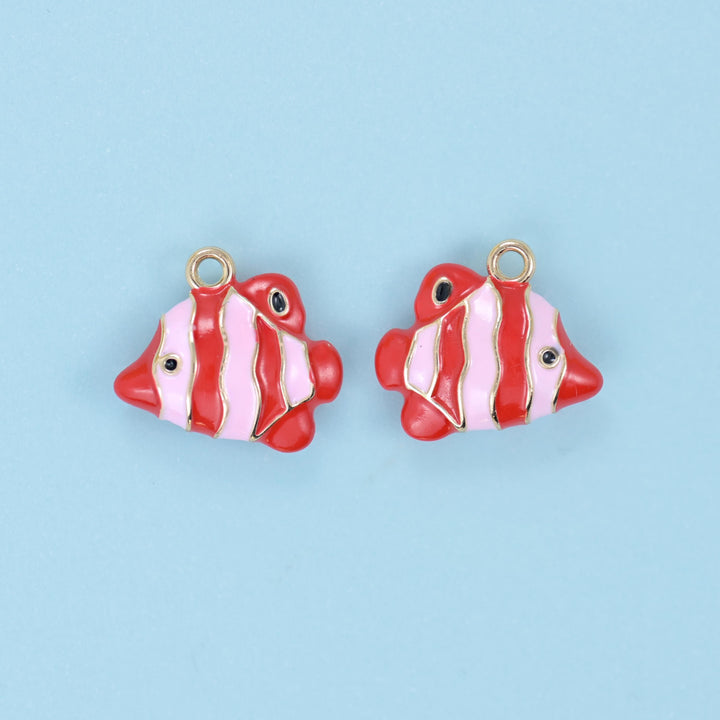 Enamel tropical fish charm in tomato red and white stripes, two charms with a black eye and gold top ring.