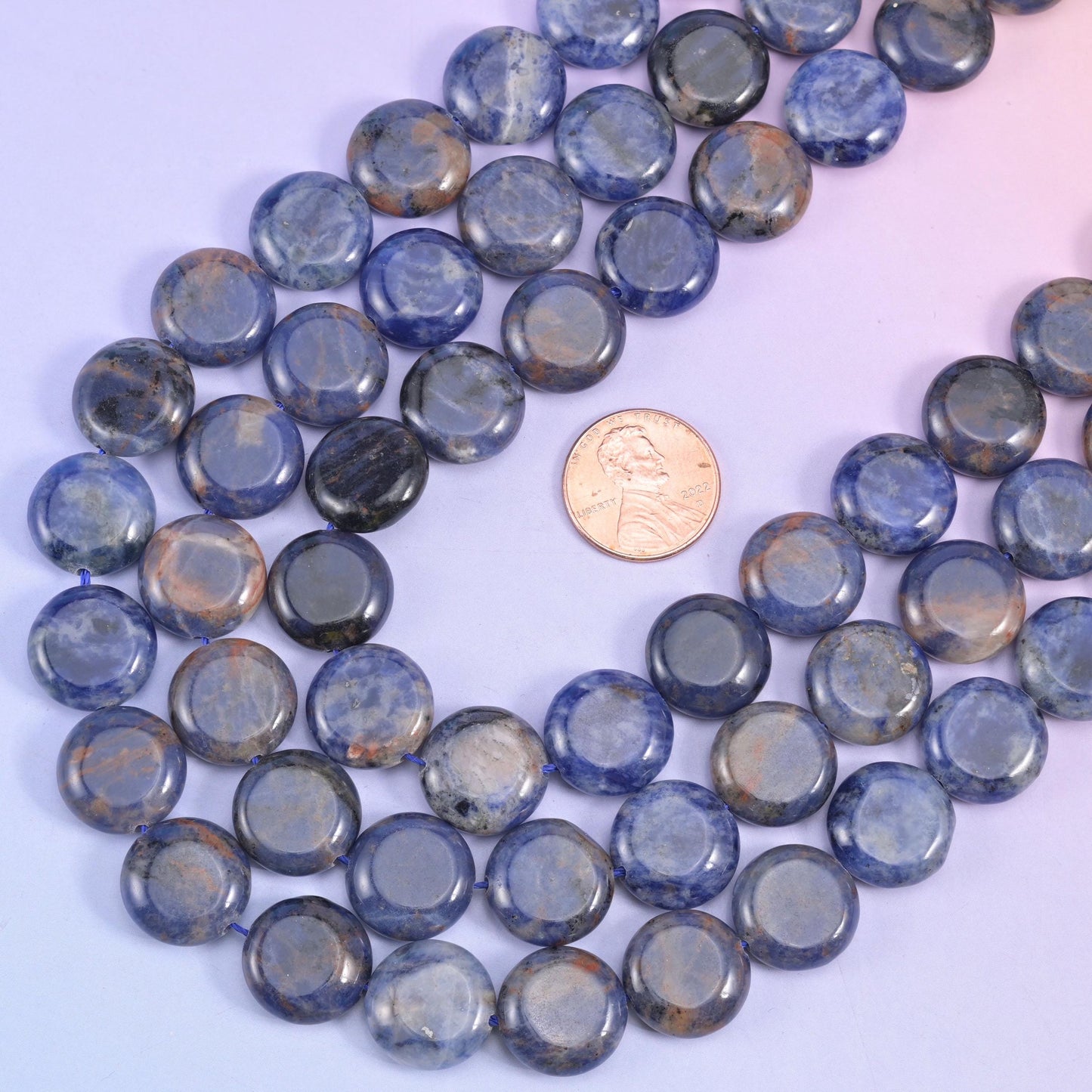 Sodalite smooth coin beads, 15 inch strand