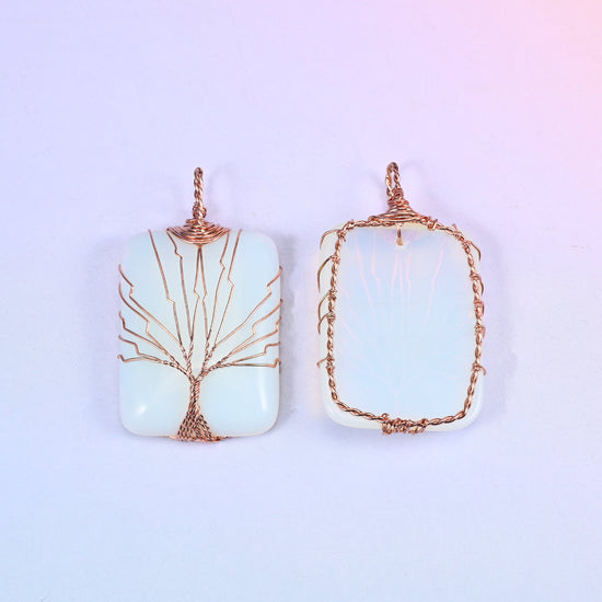 Rectangle Gemstone Tree of Life Pendant in white, front and reverse side by side against a soft lilac gradient background.