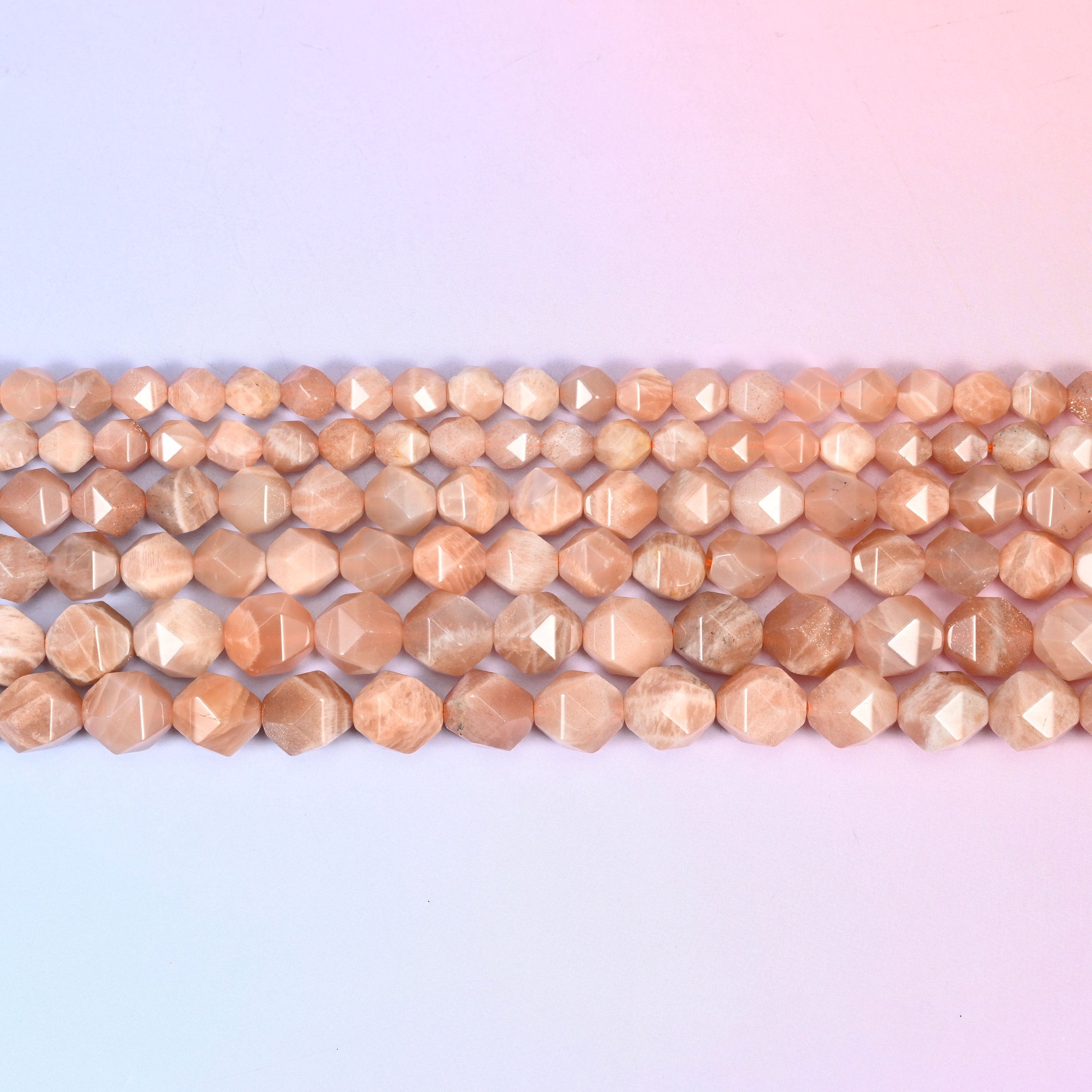 Sunstone diamond star cut beads, 15.5 inch strand