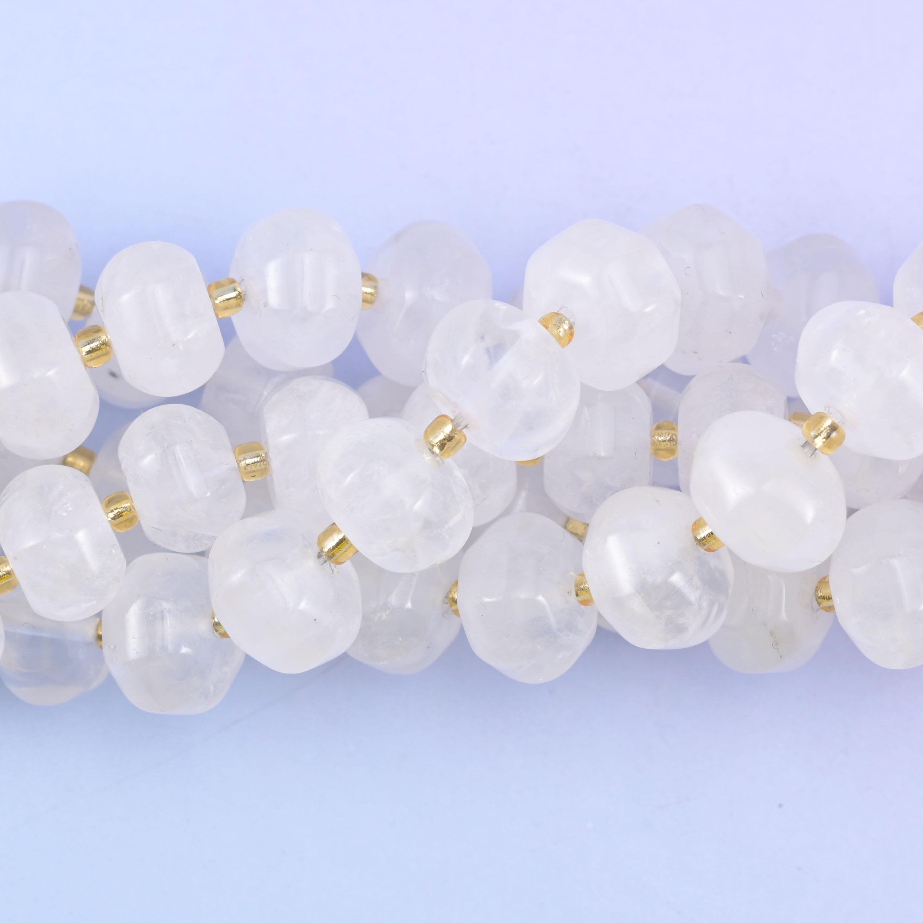 Macro of the bead sides, cloudy white quartz opening to clearer translucent patches