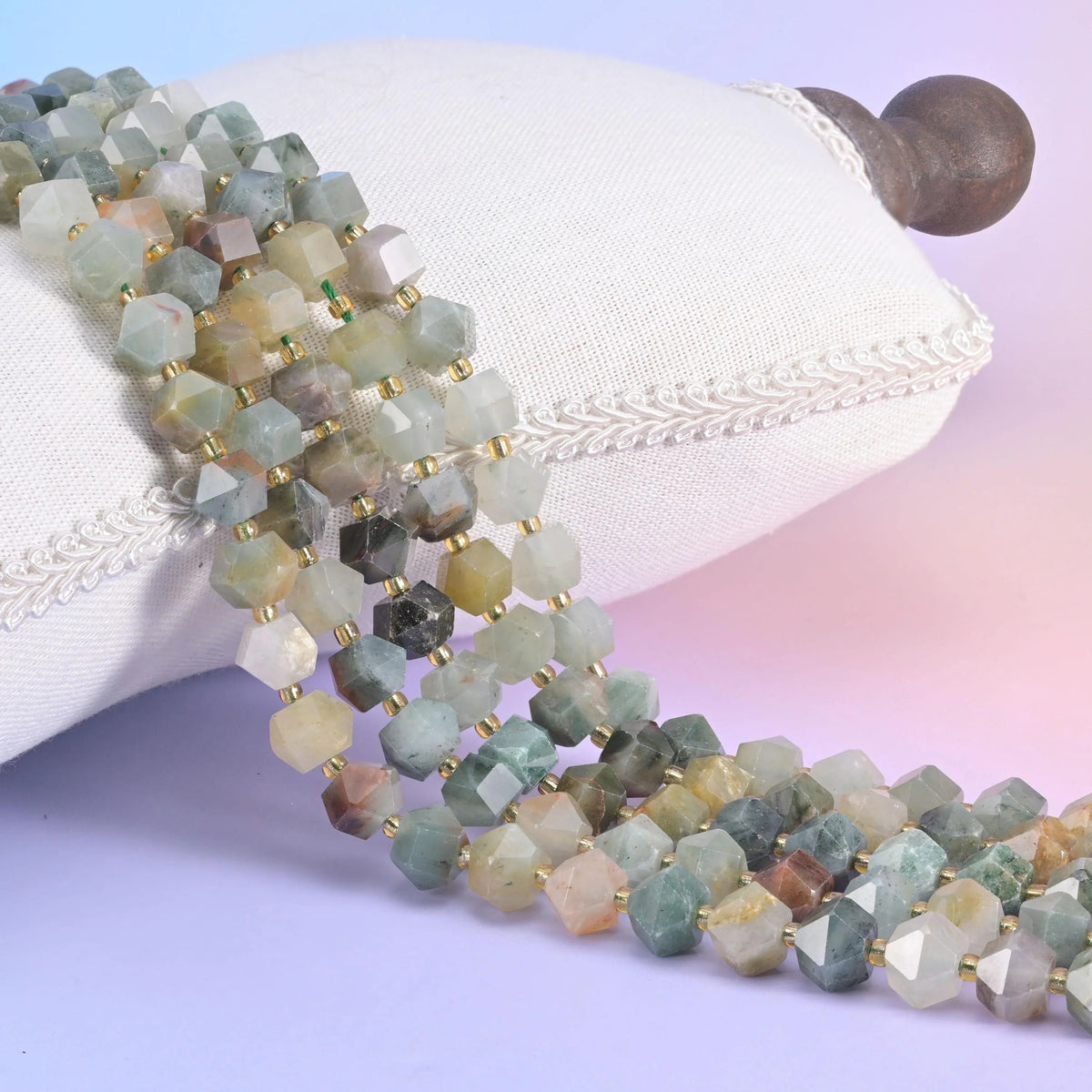 Green Grass Silk faceted diamond rhombus beads in muted sage and celadon with cream and oatmeal