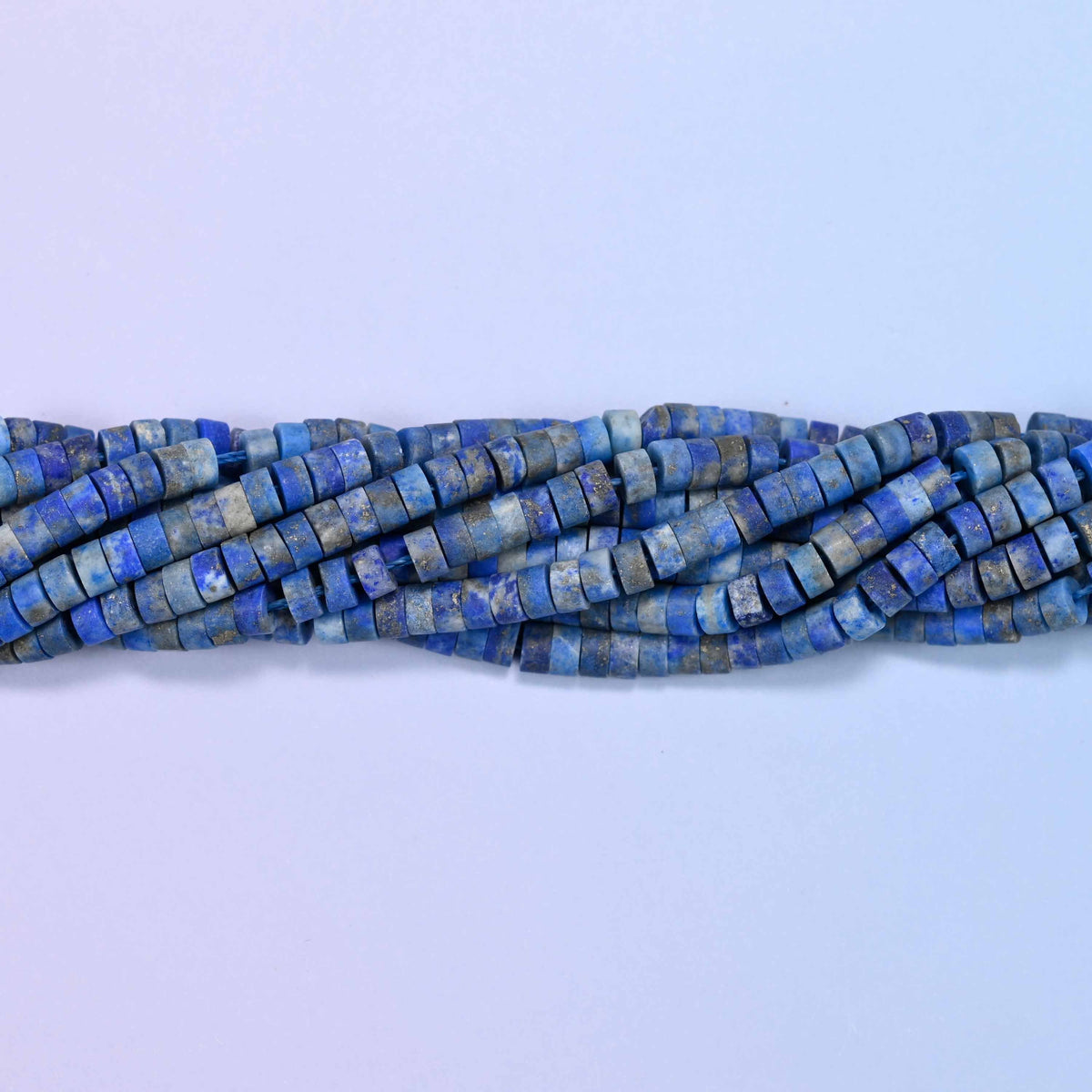 Matte lapis lazuli heishi disc beads, approximately 155 per strand