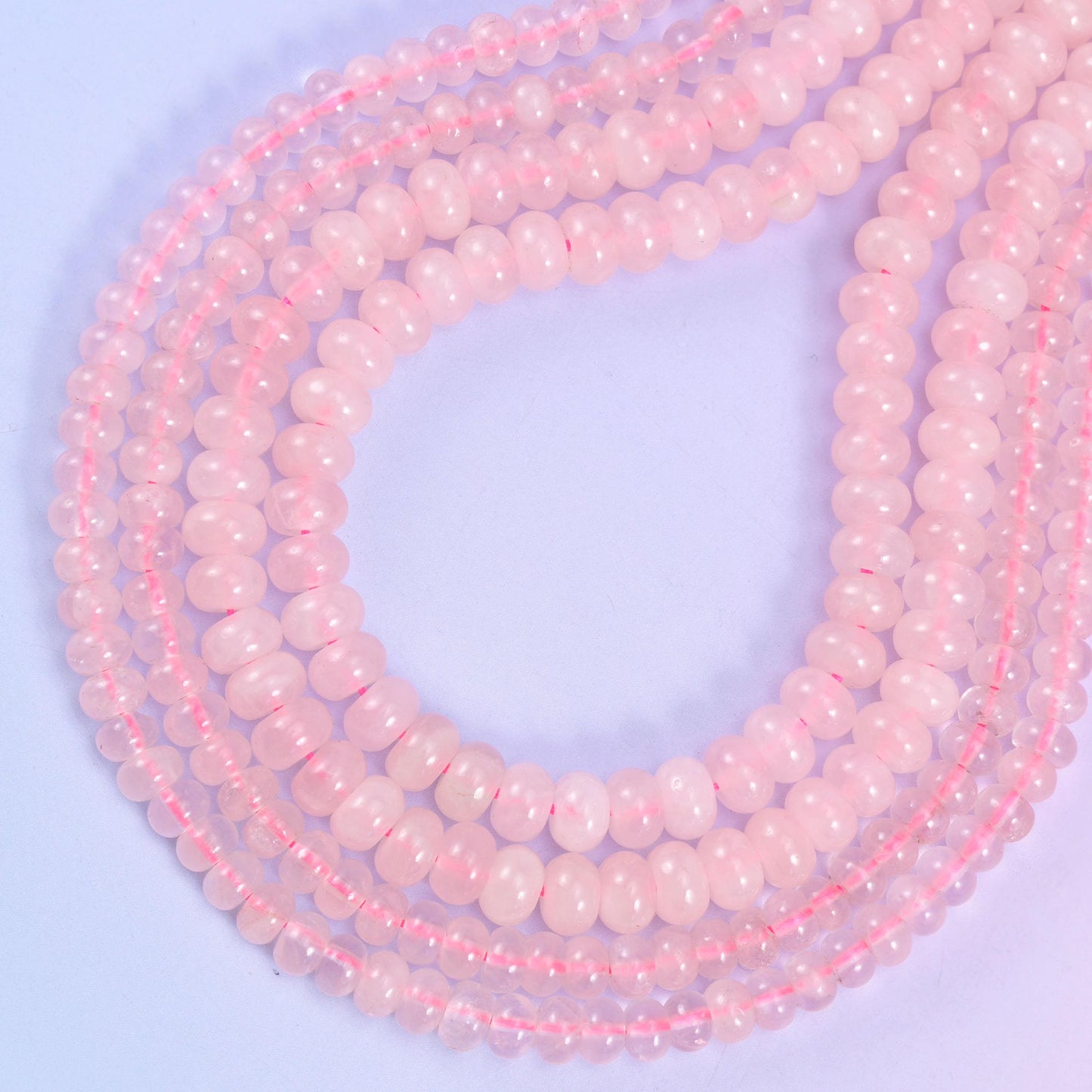 Rose Quartz rondelle beads, approximately 90 beads per strand