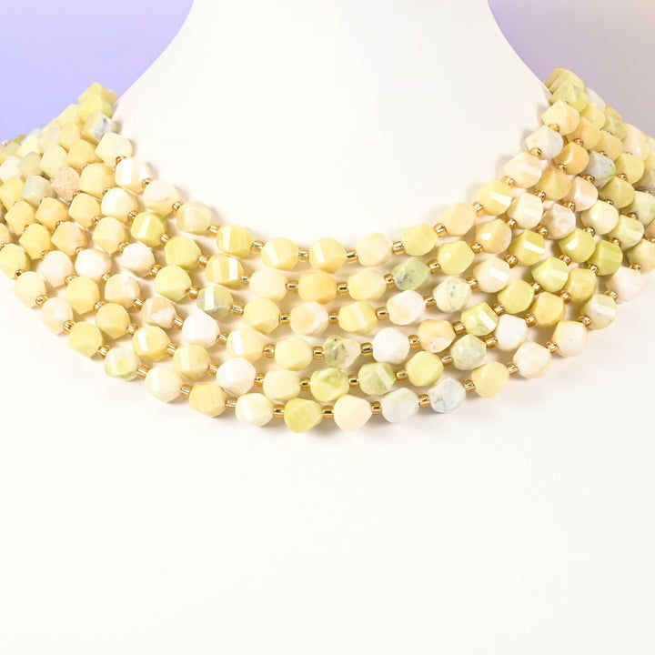 Lemon Jade yellow jade beads with a few beads carrying a green-yellow tint among the 8mm faceted beads