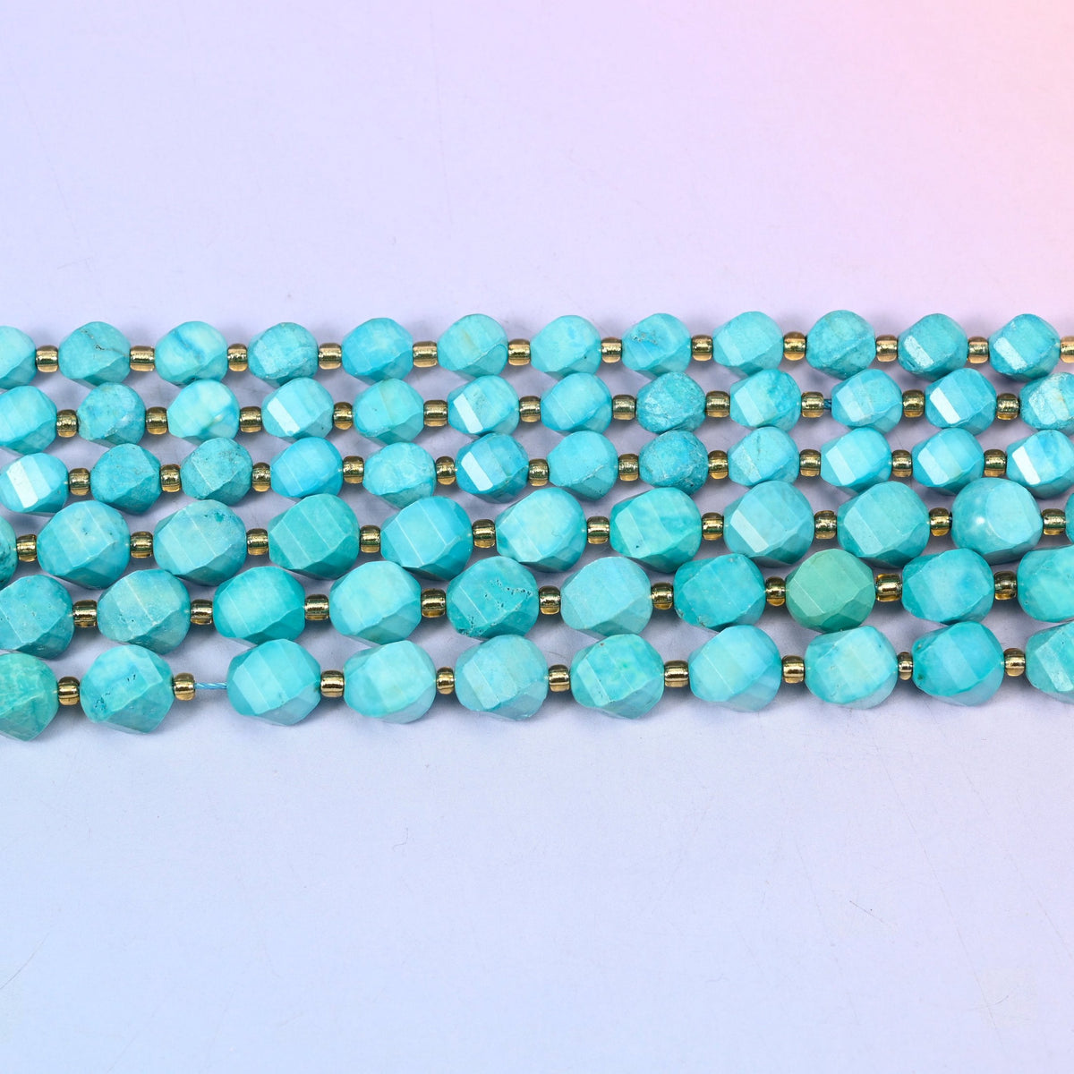 Dyed Lake Blue Howlite beads in soft turquoise lake blue with pale chalky veining