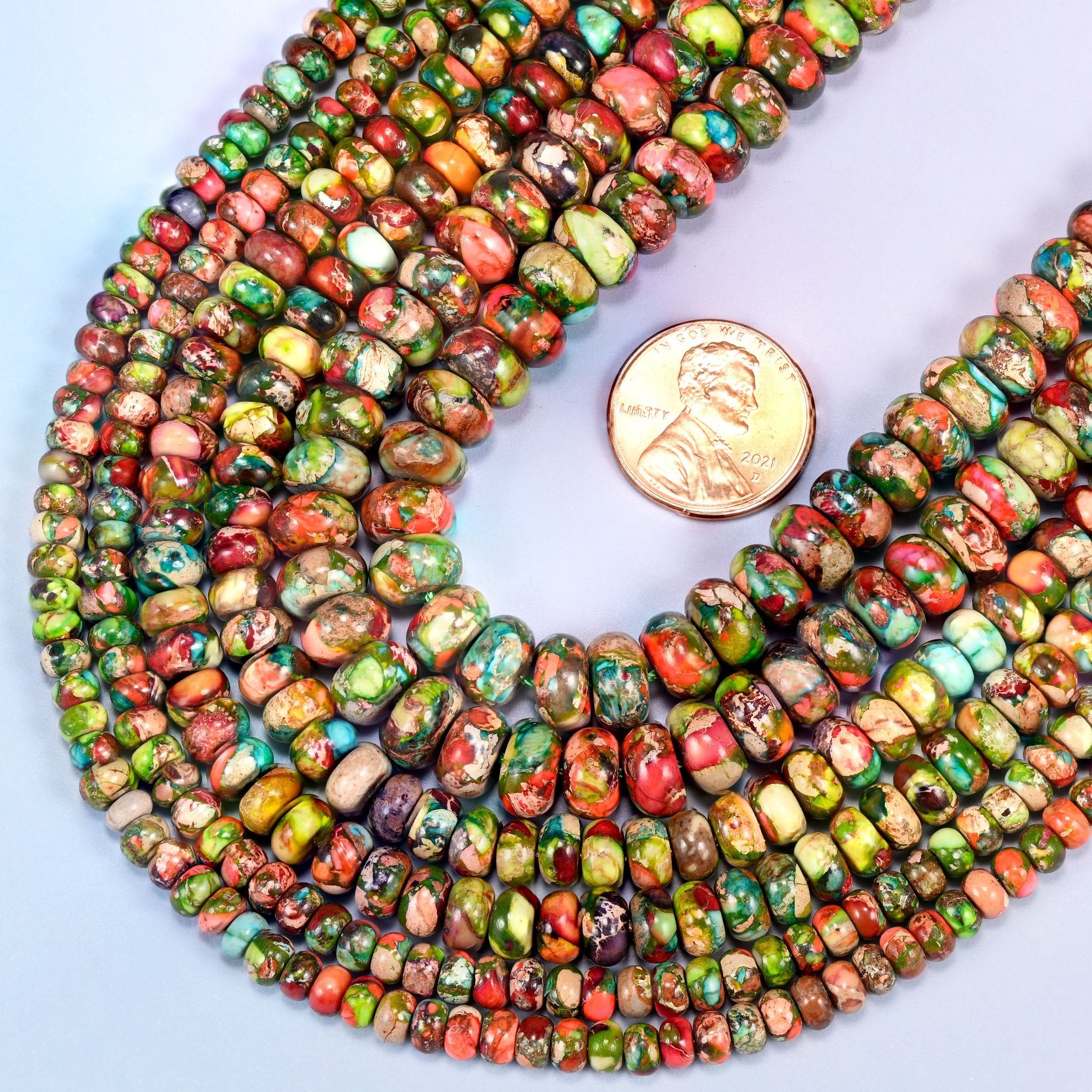 Multicolor rondelle beads in dyed Sea Sediment Jasper with dark mineral veining