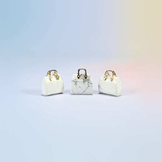Three white howlite purse crystal carvings, 1 inch, white natural stone with gray veins, gold-tone handle