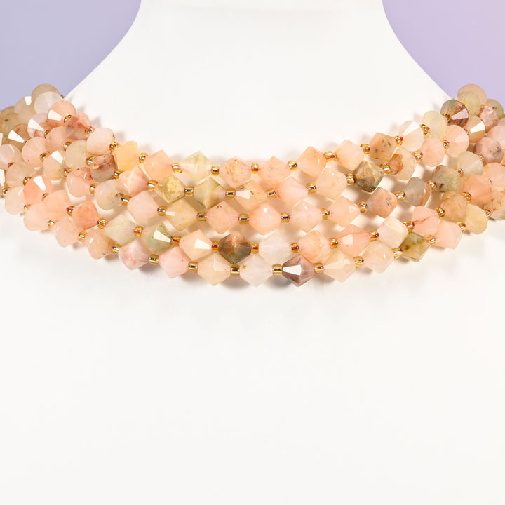 Red Grass Silk Stone bicone bead strand worn as a multi-strand choker on a display neck form.