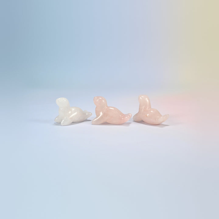 Three rose quartz sea lion crystal carvings, 1.5 inch, light pink natural stone