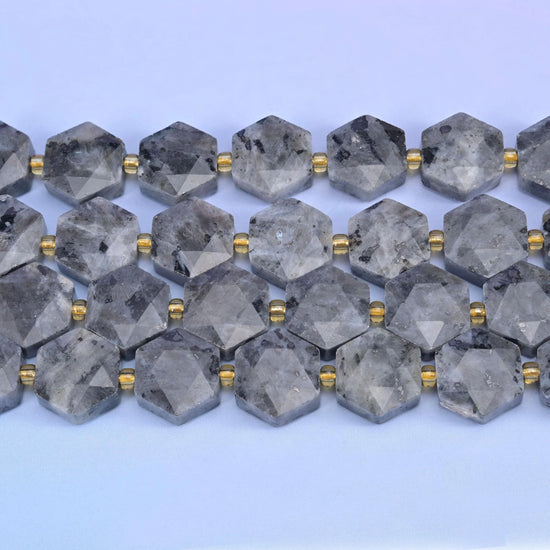 Rows of 12mm Labradorite hexagons separated by small gold-tone spacer beads