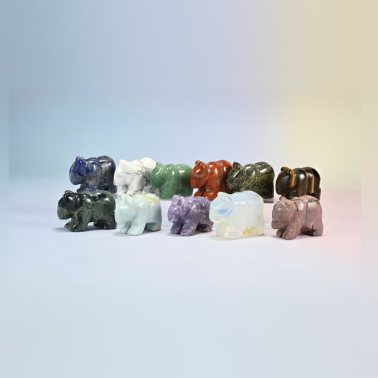 Group of 1.5 inch and 2 inch bear crystal carvings in natural stones including sodalite, amethyst, amazonite, red jasper, kambaba jasper, tiger eye, white howlite and opalite