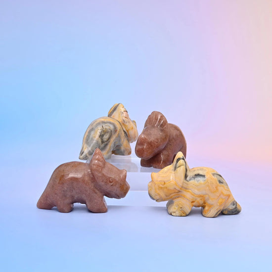 Carved gemstone triceratops figurine