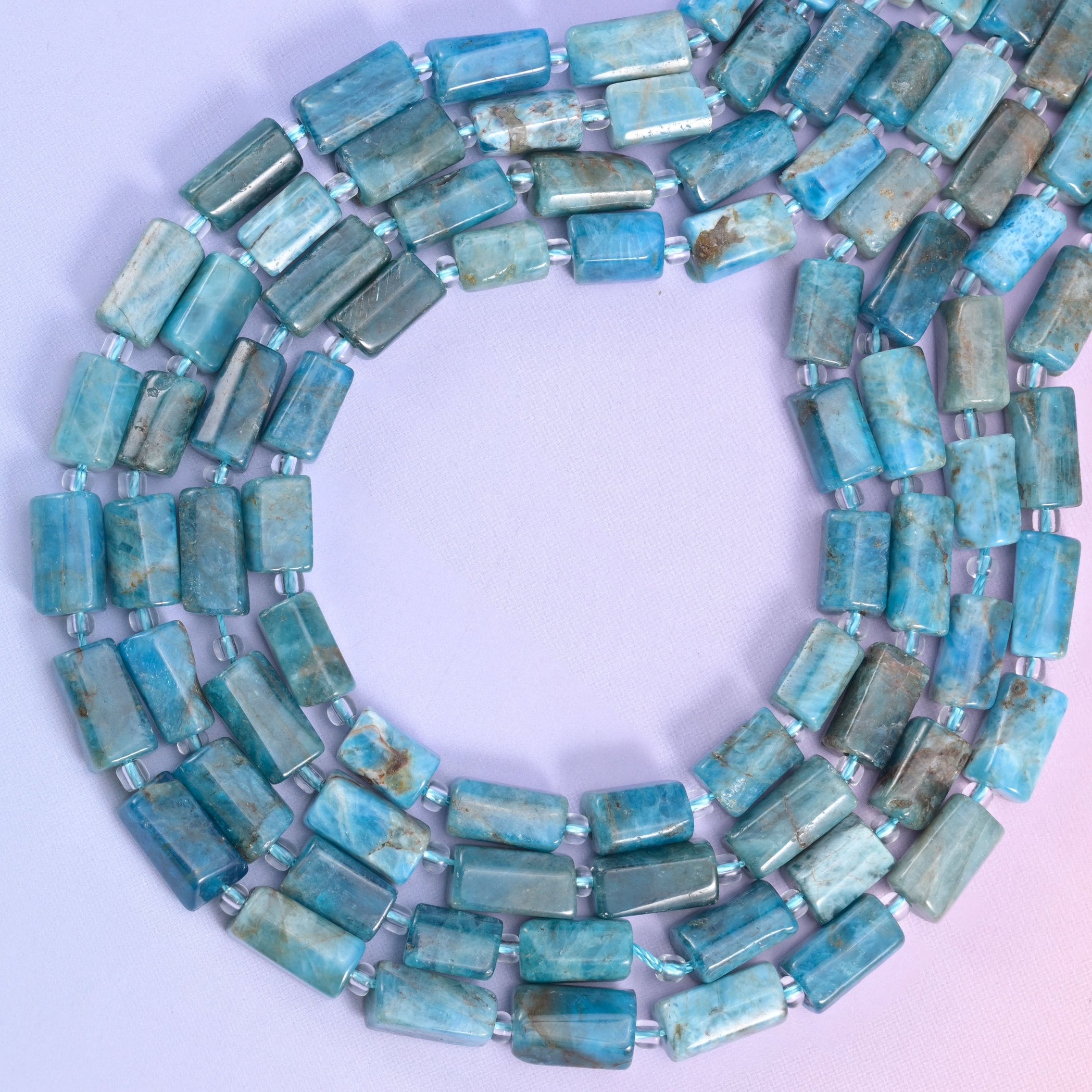 Blue apatite beads, approximately 29 beads per strand