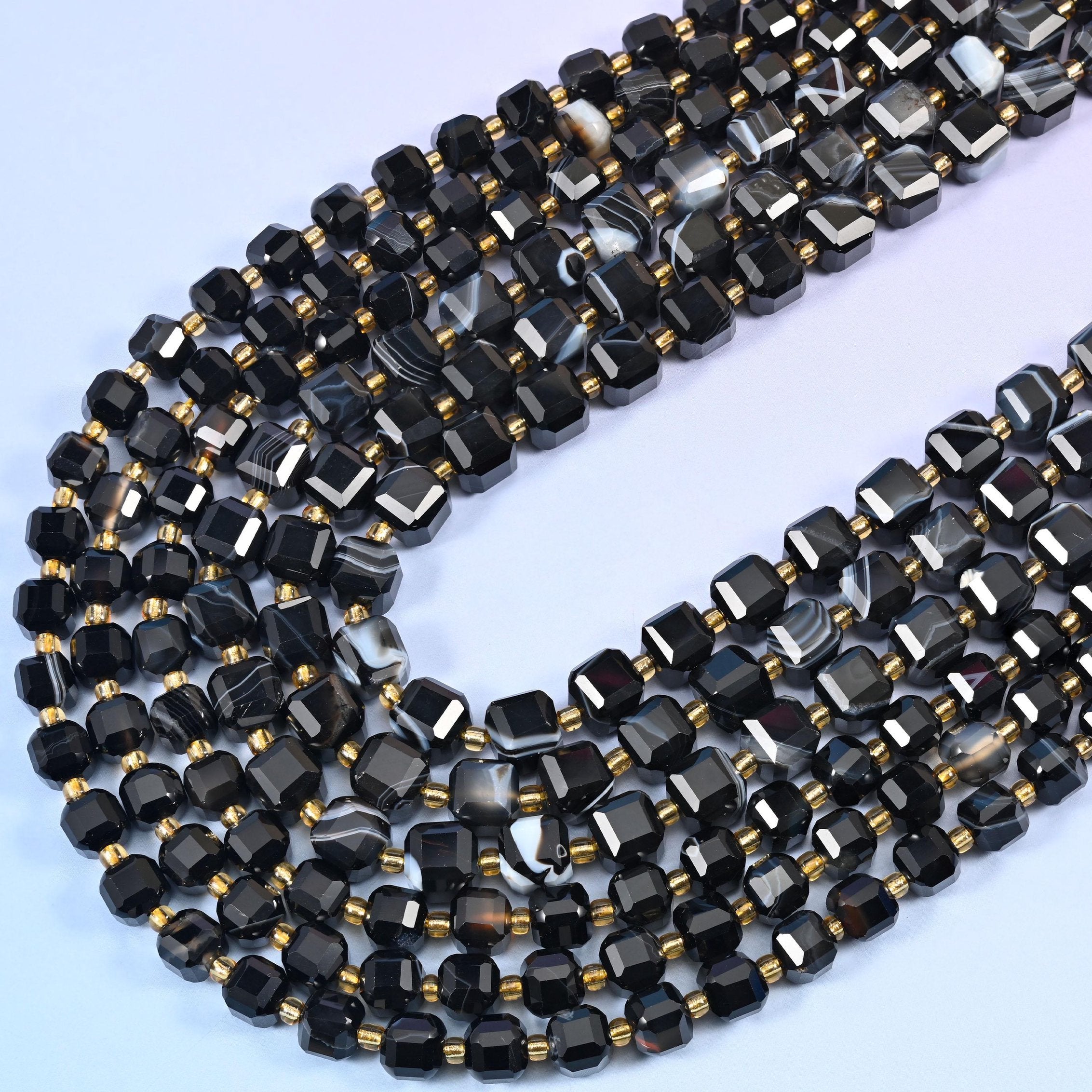 Dyed black strip agate faceted cube beads, 15 inch strand