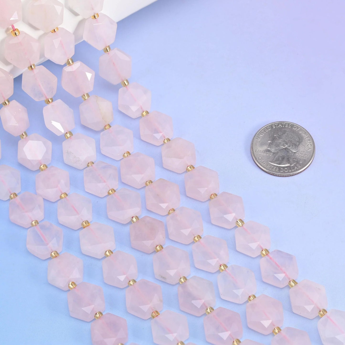 Flat faceted cut Rose Quartz beads for jewelry making.
