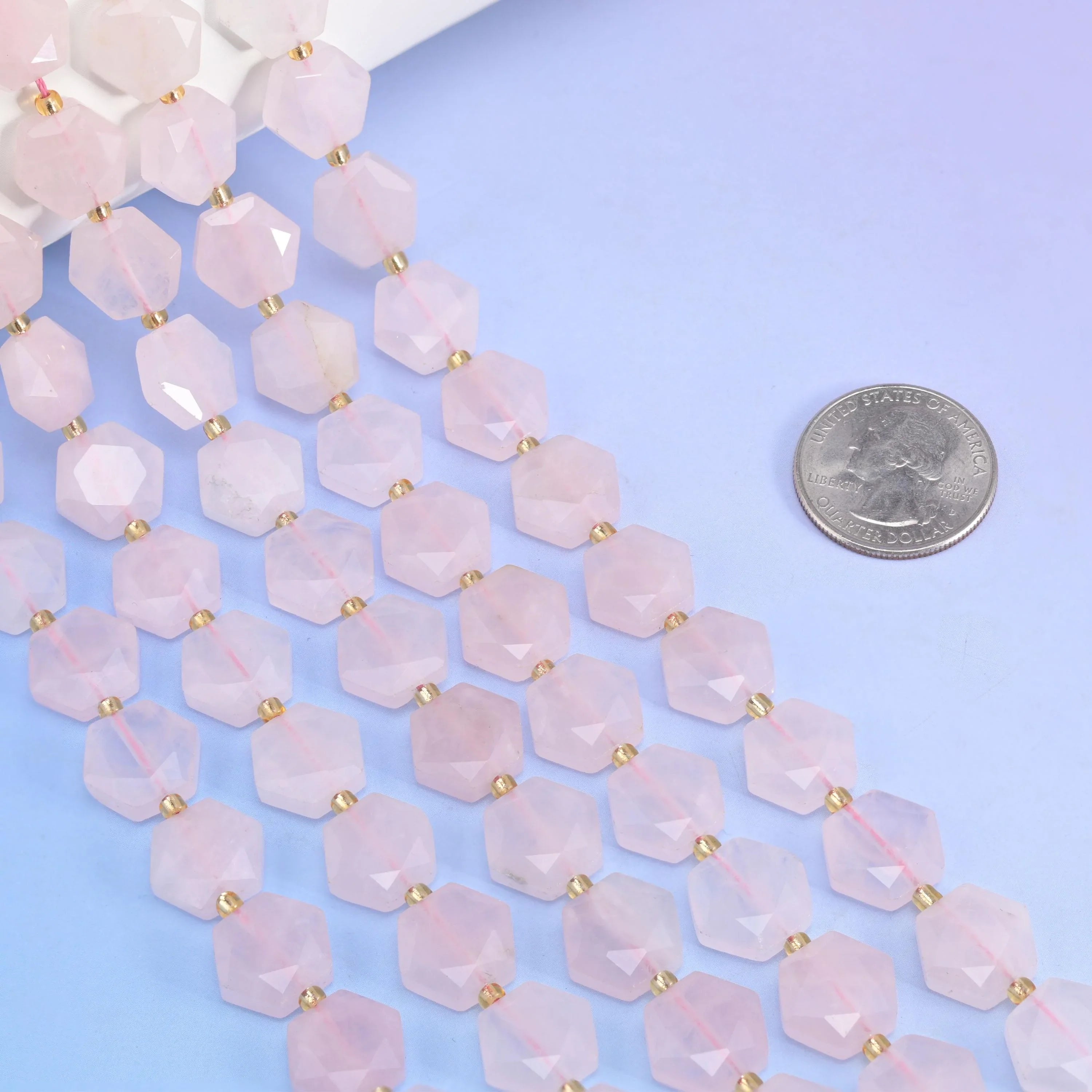 Flat faceted cut Rose Quartz beads for jewelry making.