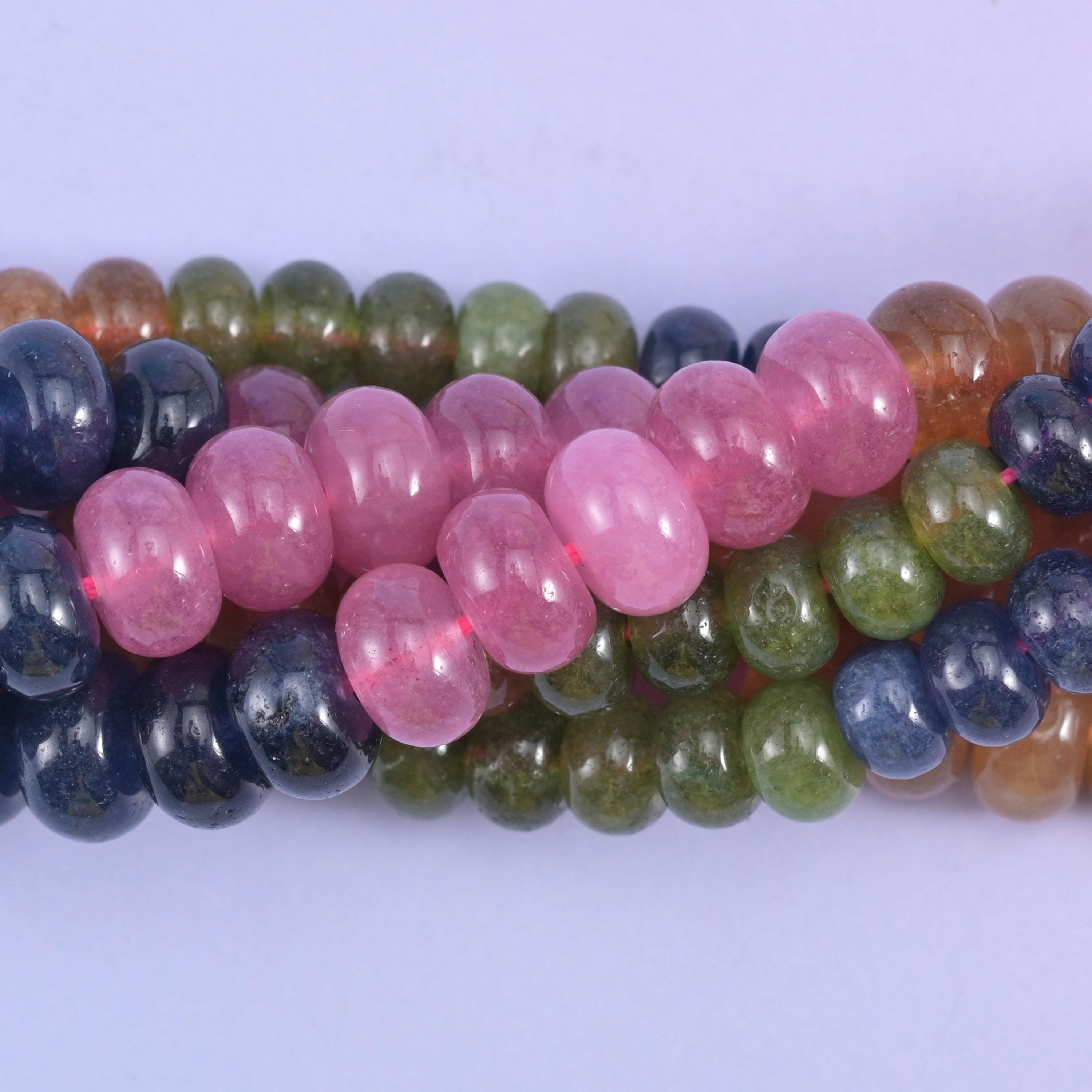 Smooth rondelle cut dyed jade beads, gently flattened and polished