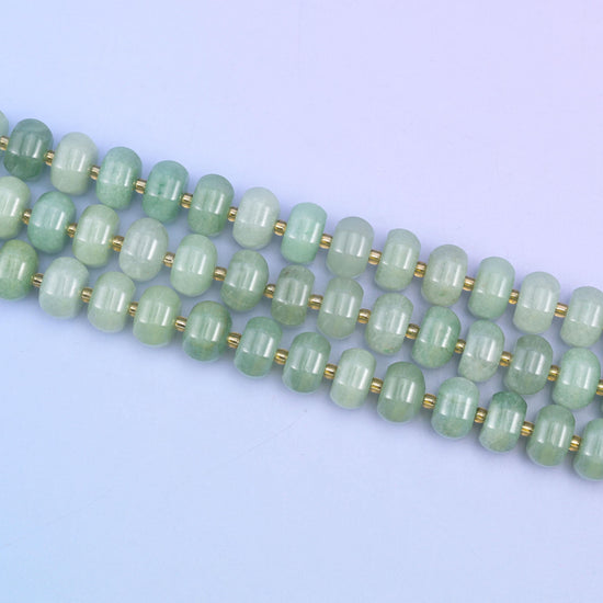 Green aventurine beads in soft mint-to-forest green with gentle sparkle