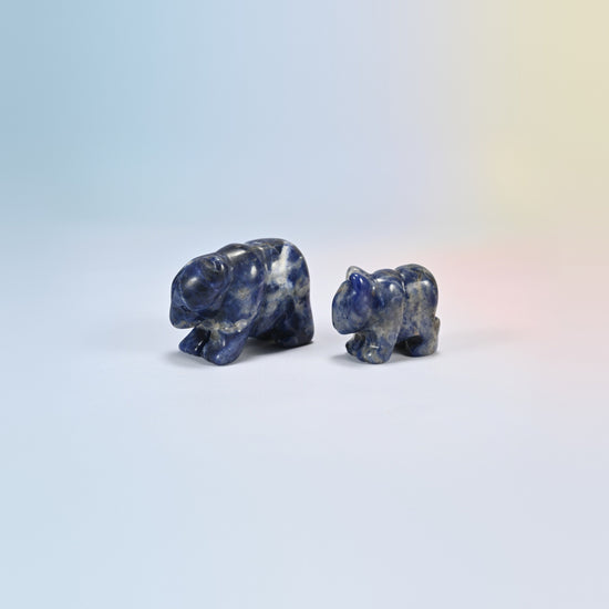 A 2 inch and a 1.5 inch sodalite bear crystal carving, deep blue natural stone with white veins