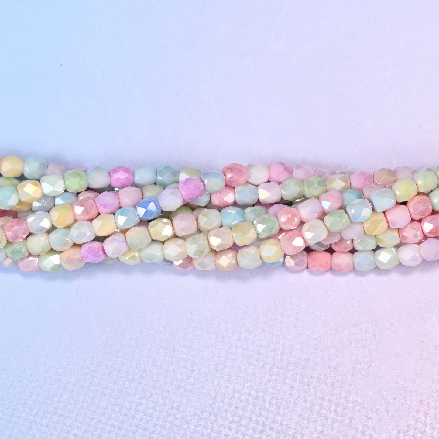 Faceted barrel glass beads for dainty stacking bracelets and delicate earring drops.