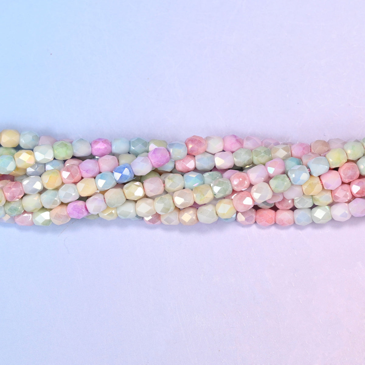 Faceted barrel glass beads for dainty stacking bracelets and delicate earring drops.