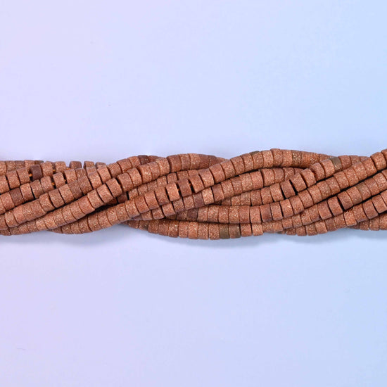 Gold sandstone (man-made glass) matte heishi disc beads in warm brown with shimmering copper flecks.