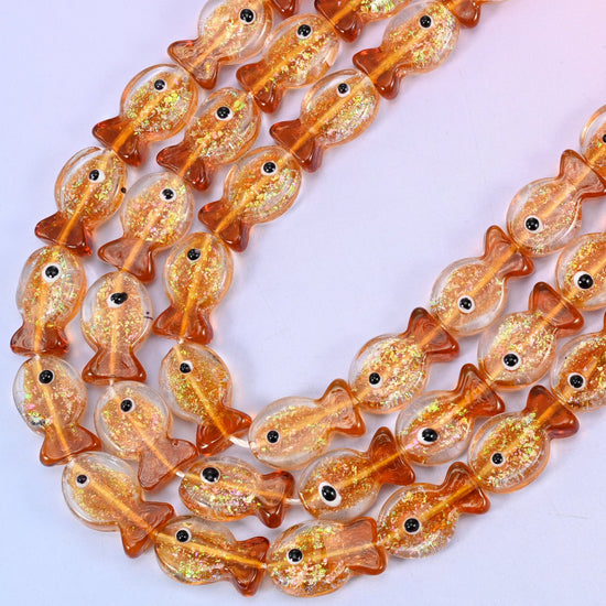 Orange Glitter Fish Glass Beads, 15.5 inch strand