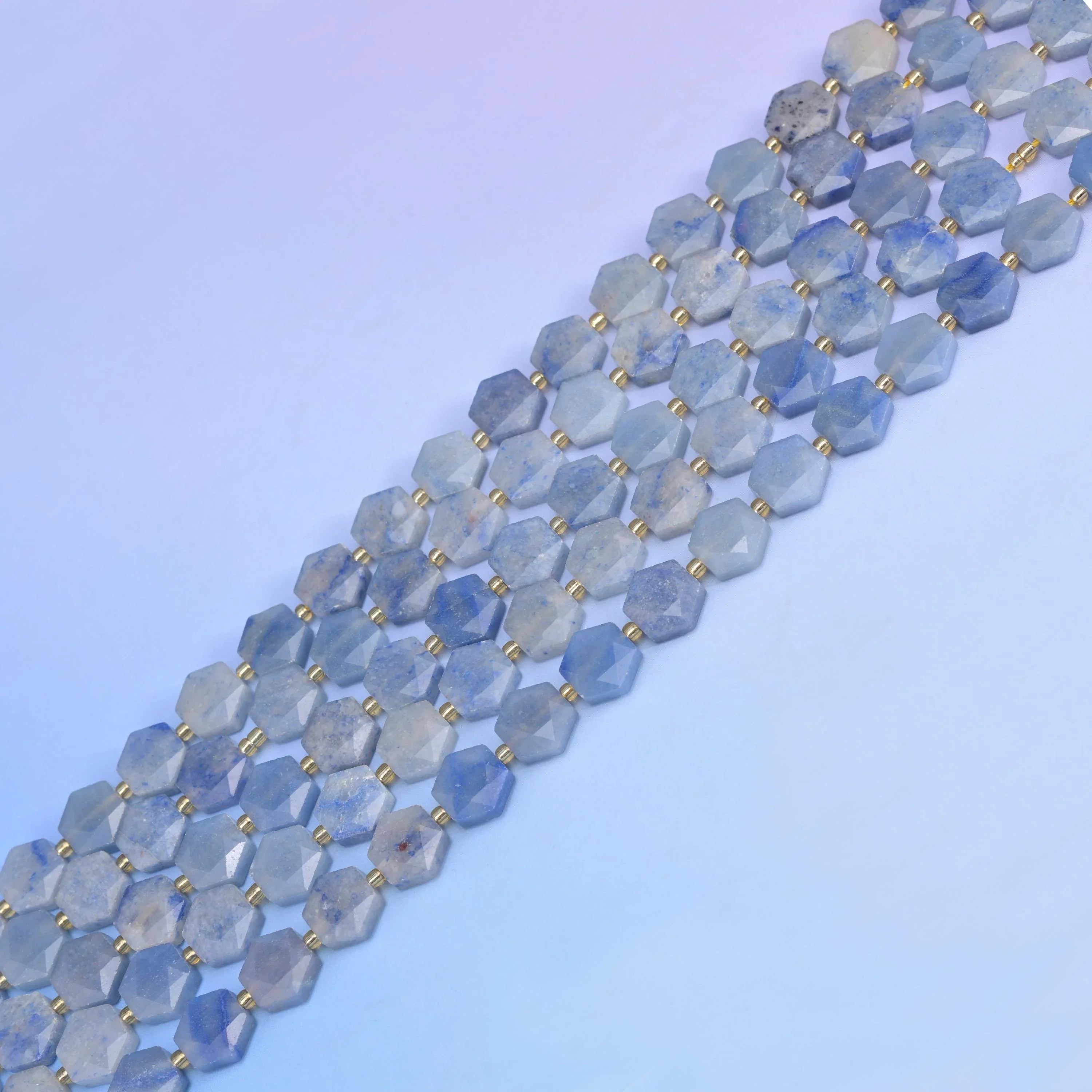 Blue Aventurine in powder blue with milky white patches.