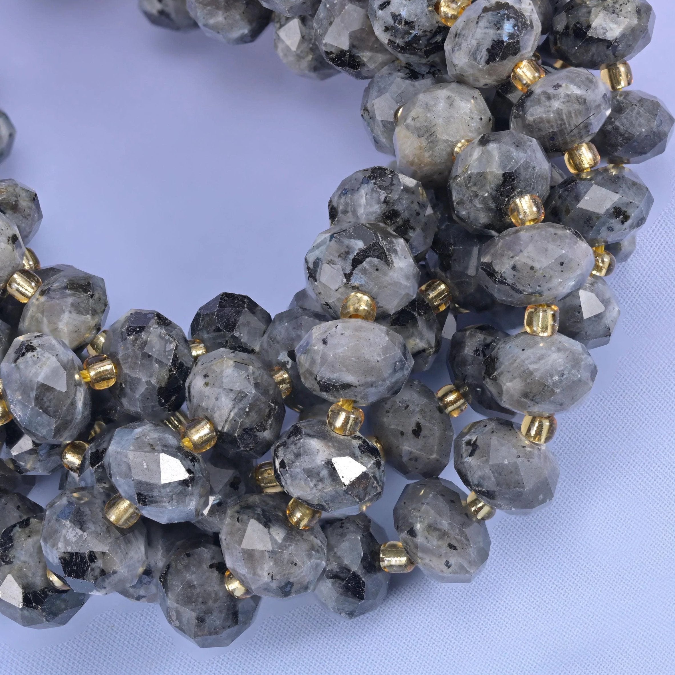 Faceted rondelle cut black labradorite beads