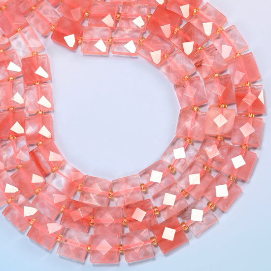 Melon quartz faceted flat square beads curved into an open loop, translucent pink beads with coral pink streaks