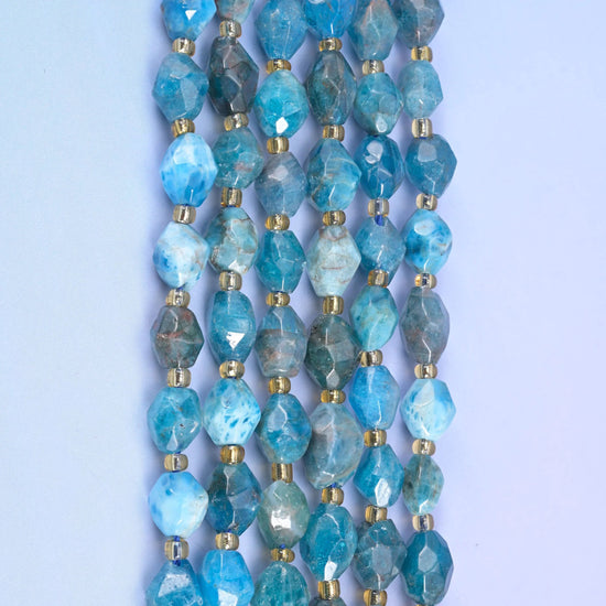 Blue Apatite rice barrel beads, 15.5 inch strand