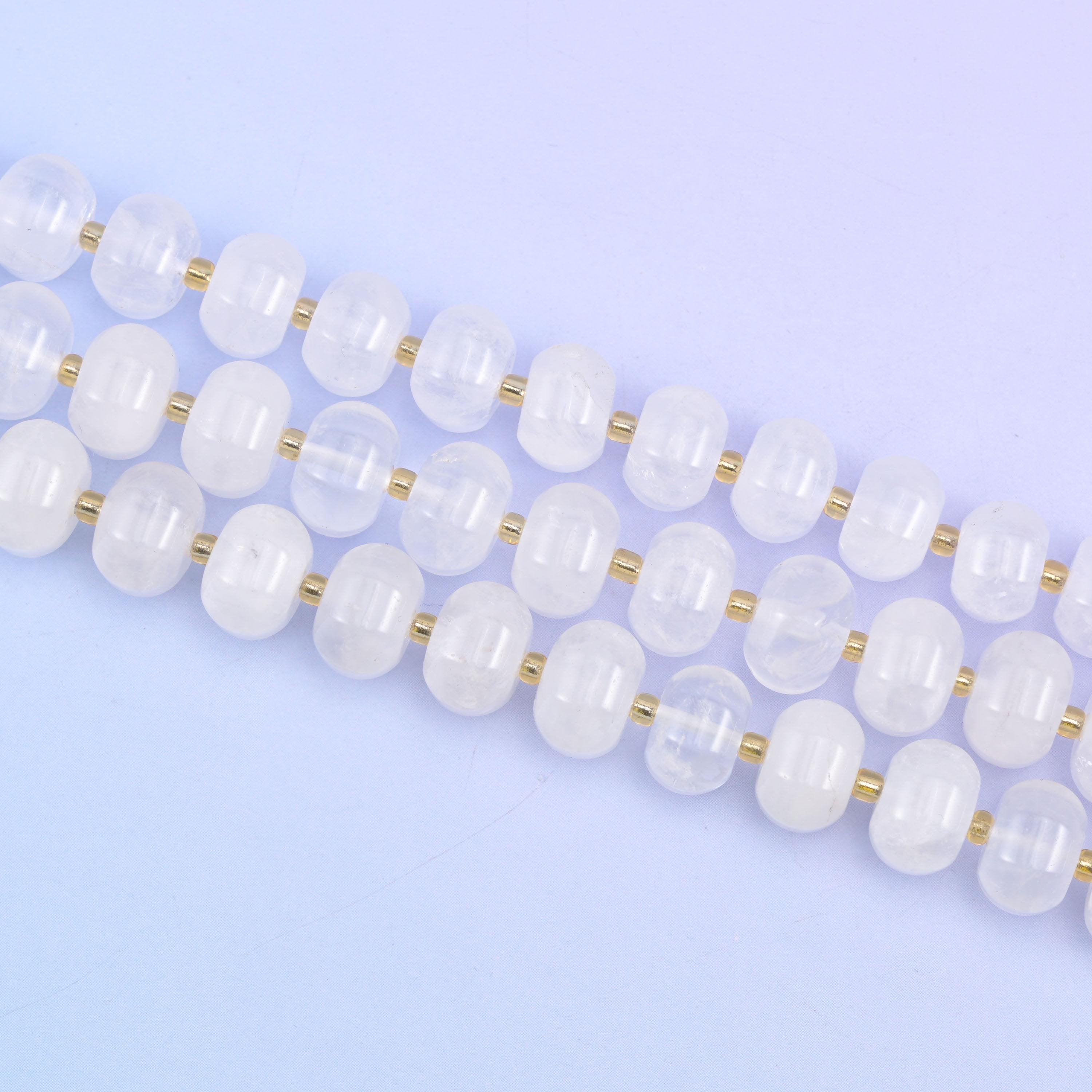 Two strands laid straight, each 12x8mm rondelle separated by a small gold spacer
