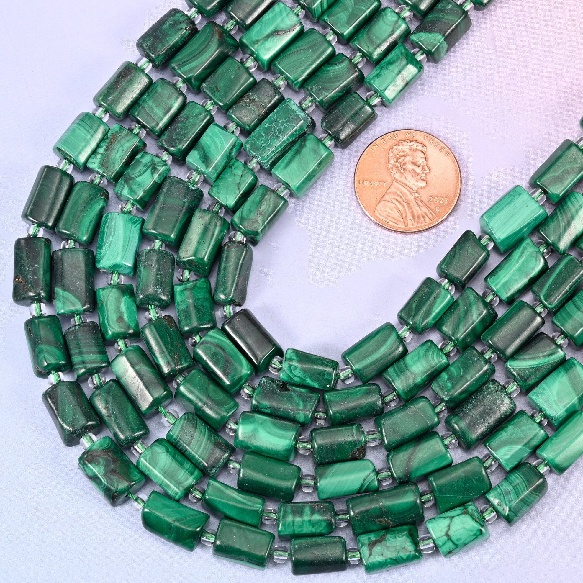 Faceted tube cut Malachite beads