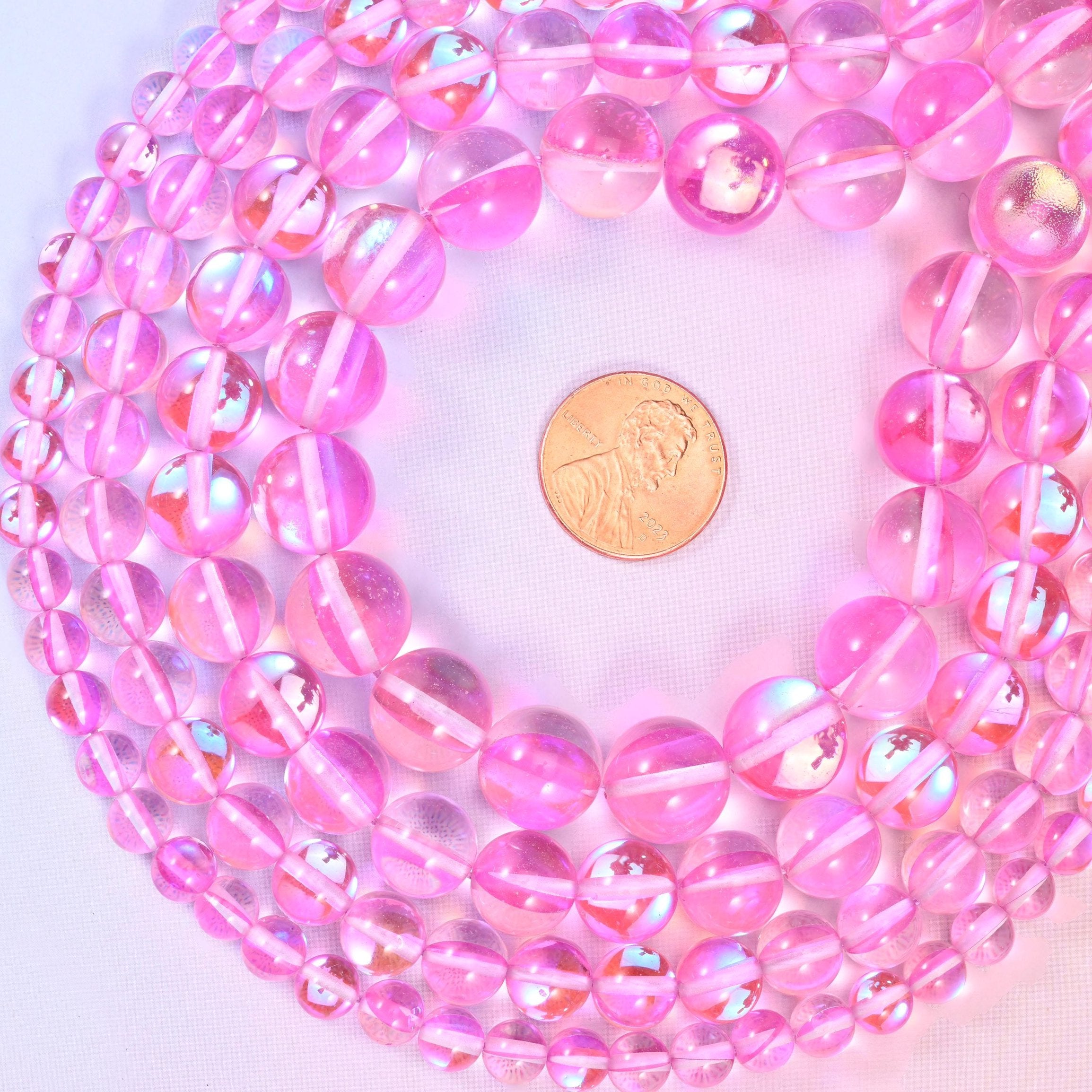 Mystic Aura Pink Round Glass Beads, sold per 15 inch strand