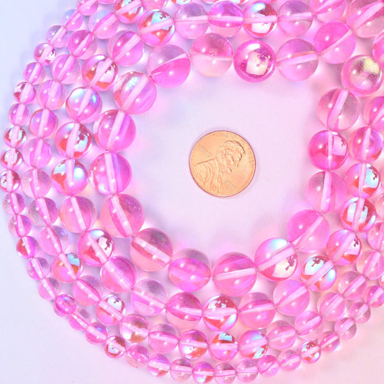 Mystic Aura Pink Round Glass Beads, sold per 15 inch strand